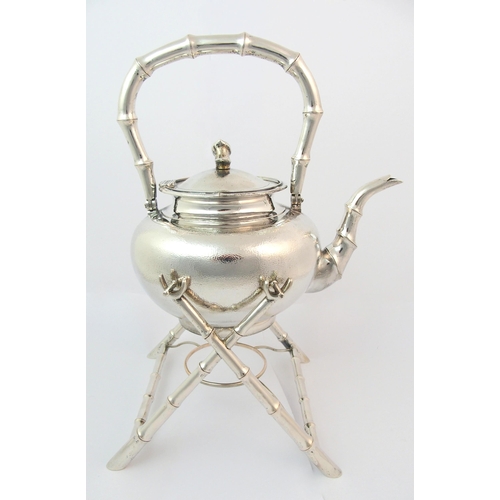 49 - A Chinese silver tea kettle and stand