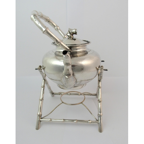 49 - A Chinese silver tea kettle and stand