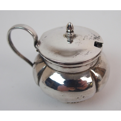 51 - A Chinese silver pepper caster and salt cellar