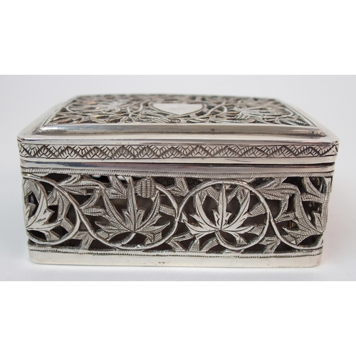 52 - An Asian white metal pierced box