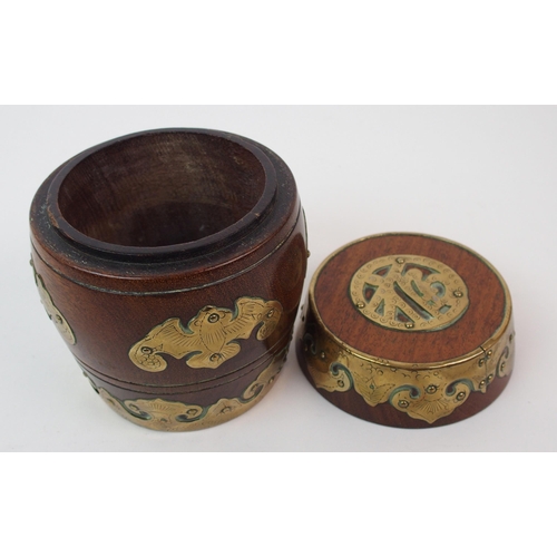 63 - Two Chinese hardwood and brass mounted barrel shaped tobacco jars