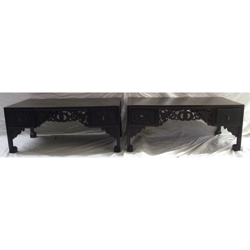 66 - A pair of Chinese hardwood rectangular low tables