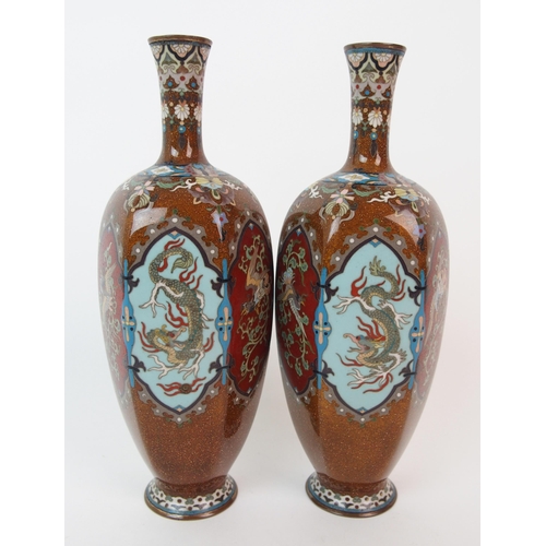 68 - A pair of Japanese hexagonal cloisonne vases