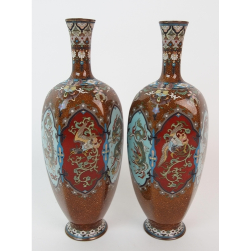 68 - A pair of Japanese hexagonal cloisonne vases