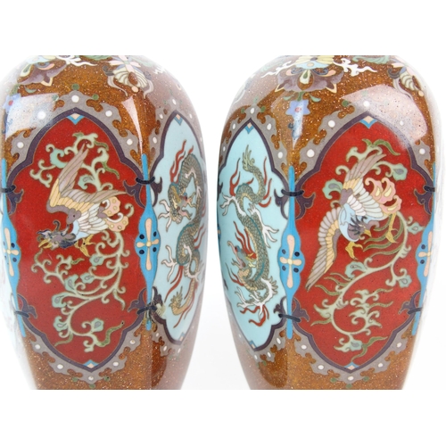 68 - A pair of Japanese hexagonal cloisonne vases