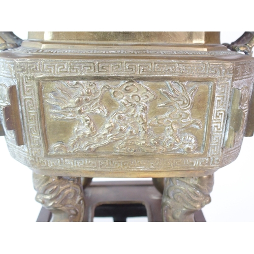 73 - A Chinese bronze censor  cover and stand