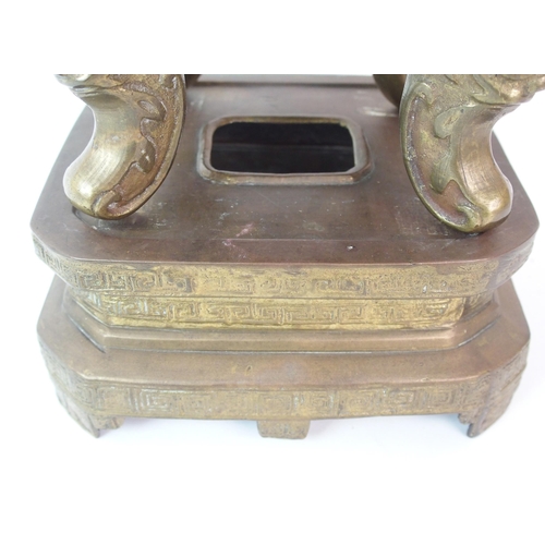 73 - A Chinese bronze censor  cover and stand