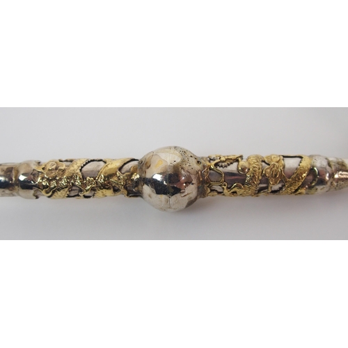 74 - A Chinese silver and gilt opium pipe