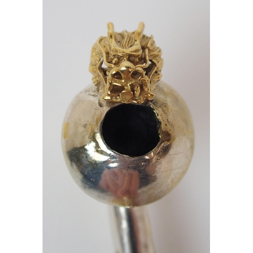 74 - A Chinese silver and gilt opium pipe