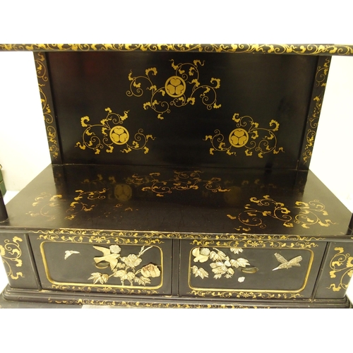 75 - A Japanese black and gold lacquered Shodhana cabinet