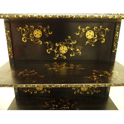 75 - A Japanese black and gold lacquered Shodhana cabinet