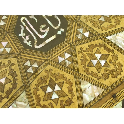 77 - A Moorish octagonal inlaid table