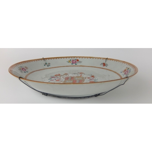 79 - A pair of Chinese export armorial dishes