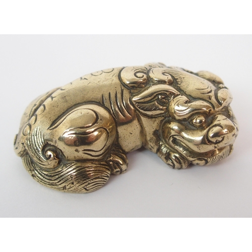 84 - A Chinese brass model of a Shishi