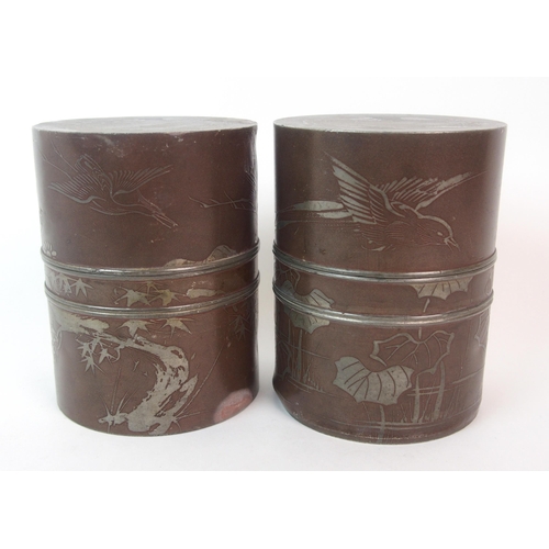 86 - A pair of Chinese pewter cylindrical tea canisters