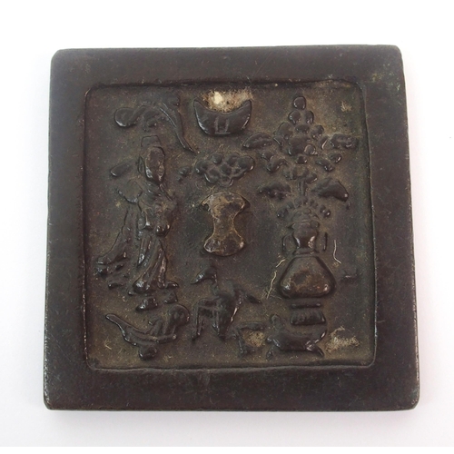 87 - A Chinese bronze square hand mirror