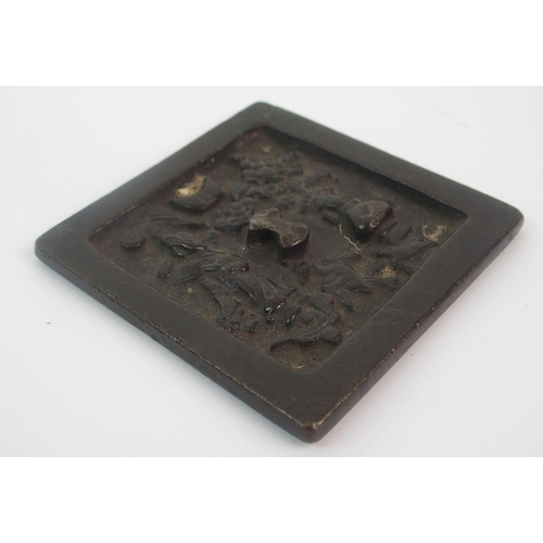 87 - A Chinese bronze square hand mirror