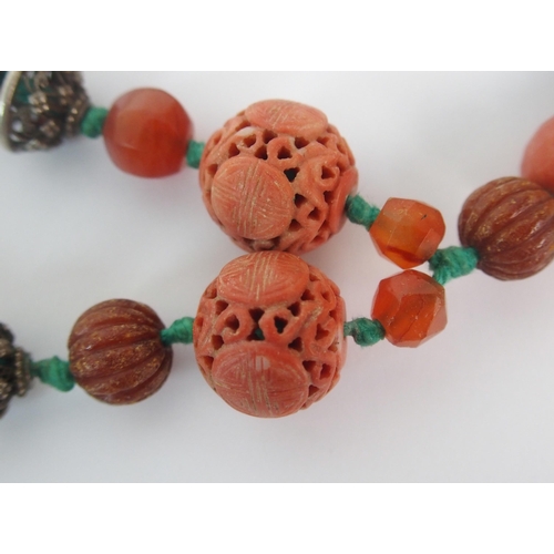 91 - Two Chinese hardstone ceramic and silver bead necklaces