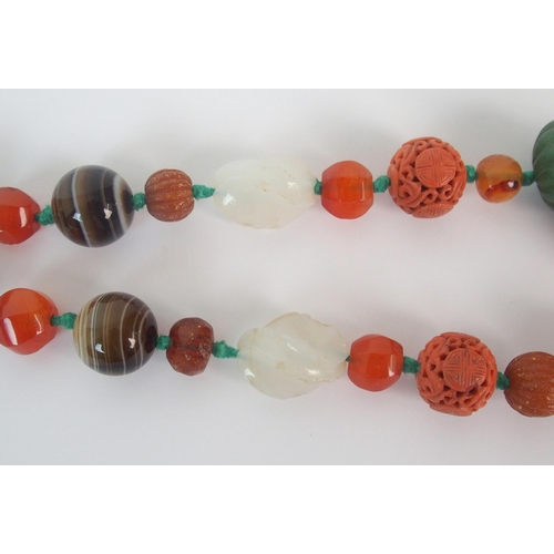 91 - Two Chinese hardstone ceramic and silver bead necklaces