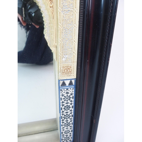 92 - A painted plaster and alabaster Alhambra wall mirror