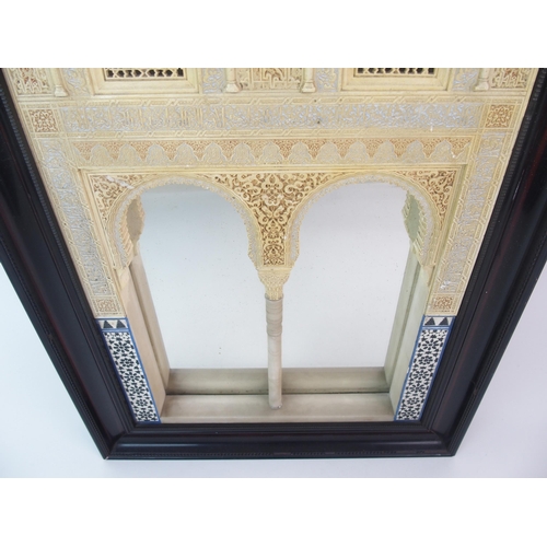 92 - A painted plaster and alabaster Alhambra wall mirror