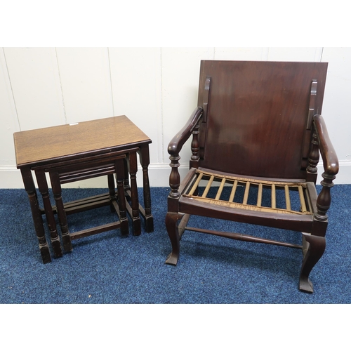 22 - A 20th century mahogany metamorphic parker knoll chair/occasional table and an oak nest of three tab... 