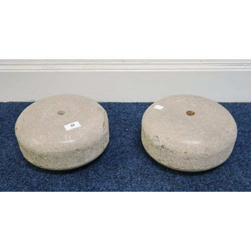 28 - A pair of polished stone curling stones (2)