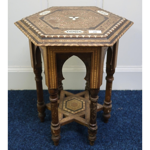 29 - A late 19th century Moorish hexagonal table inlaid with assorted sample woods and mother of pearl, 5... 