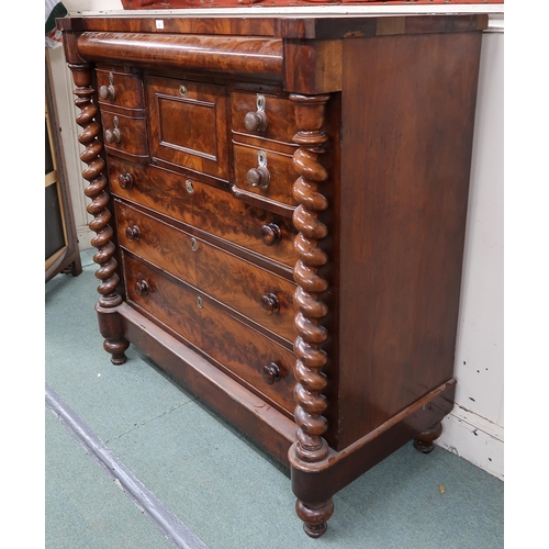32 - A Victorian mahogany Scotch chest of drawers with barley twist columns flanking central bank of draw... 