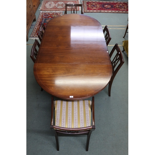 40 - A 20th century mahogany D-end extending dining table and six dining chairs (7)