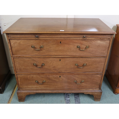 42 - A Georgian mahogany three drawer chest on bracket feet, 99cm high x 111cm wide x 56cm deep