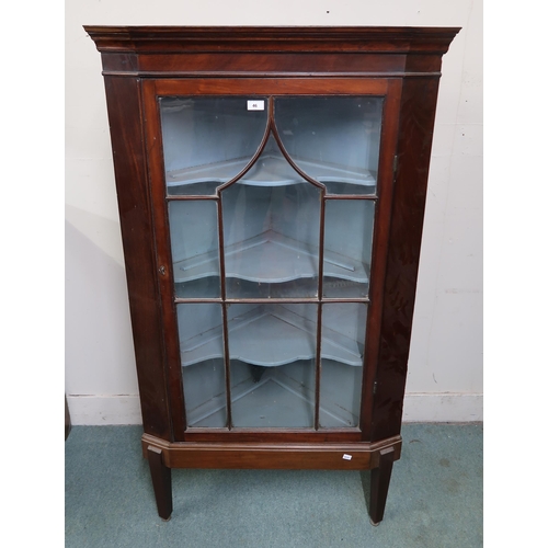 46 - A Victorian mahogany glazed single door corner cabinet, 152cm high x 85cm wide x 44cm deep