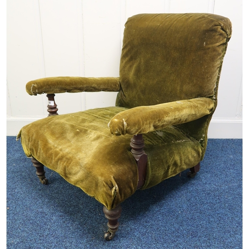56 - A Victorian mahogany framed  armchair upholstered in green velvet, stamped 