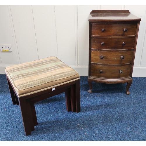 71 - A 20th century mahogany bow front chest of four drawers and a Parker Knoll nest of three stools (2)