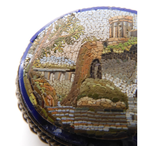 628 - An (af) micro mosaic brooch depicting roman ruins