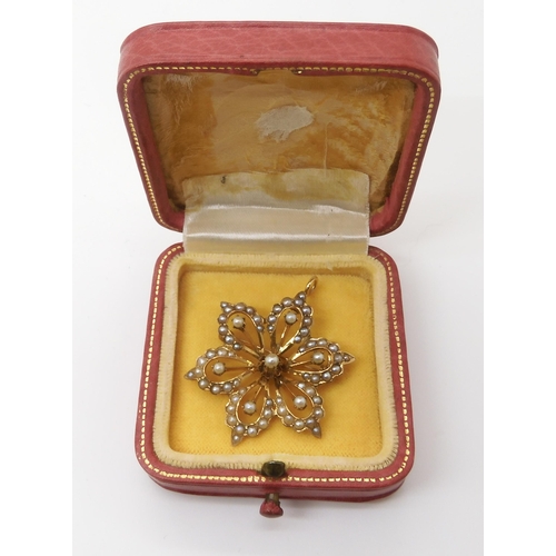 630 - A 14k gold pearl set Edwardian flower pendant brooch, diameter 3.3cm, weight 5gms