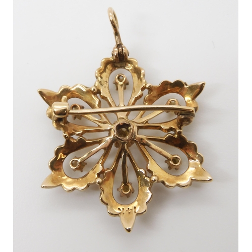 630 - A 14k gold pearl set Edwardian flower pendant brooch, diameter 3.3cm, weight 5gms