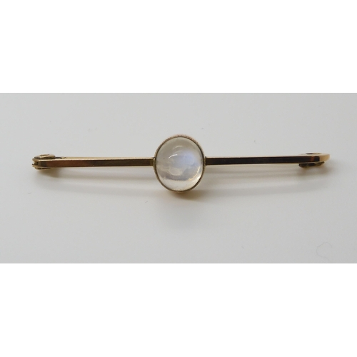 652 - THREE VINTAGE BROOCHESa 9ct gold moonstone bar brooch, moonstone approx 9mm x 7.6mm, length 5cm, wei... 