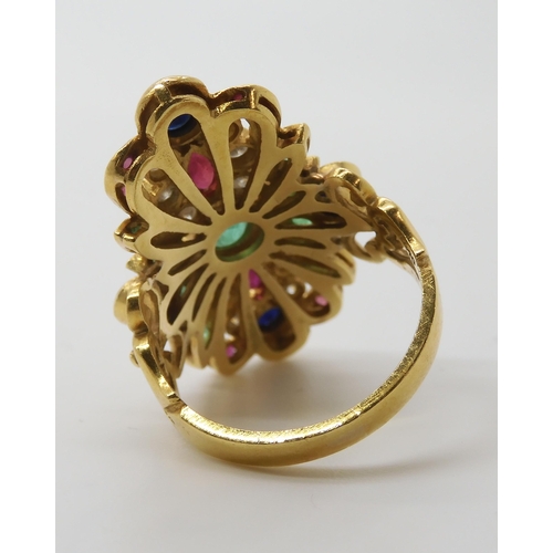 658 - A BRIGHT YELLOW METAL GEM SET RINGstamped 750 to the inner shank, set with rubies, sapphires, emeral... 