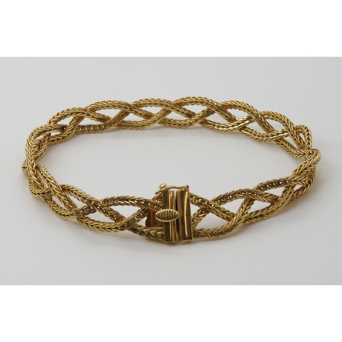 659 - AN 18CT GOLD ITALIAN MADE PLAITED BRACELETmade from three strands of herringbone chain, with Italian... 