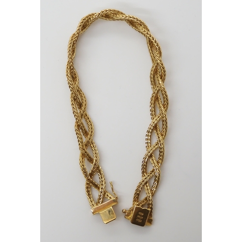 659 - AN 18CT GOLD ITALIAN MADE PLAITED BRACELETmade from three strands of herringbone chain, with Italian... 