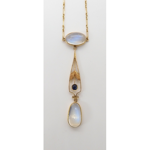 661 - AN 18CT GOLD EDWARDIAN MOONSTONE NECKLETthe pendant further set with a sapphire. The largest moonsto... 