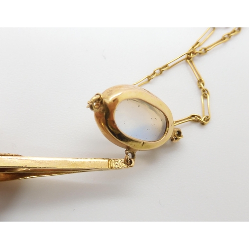 661 - AN 18CT GOLD EDWARDIAN MOONSTONE NECKLETthe pendant further set with a sapphire. The largest moonsto... 