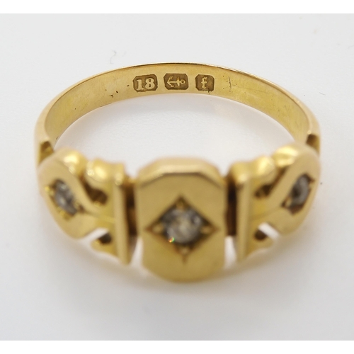 662 - A VICTORIAN DIAMOND SET RINGset with three old cut diamonds, with an estimated approx diamond conten... 