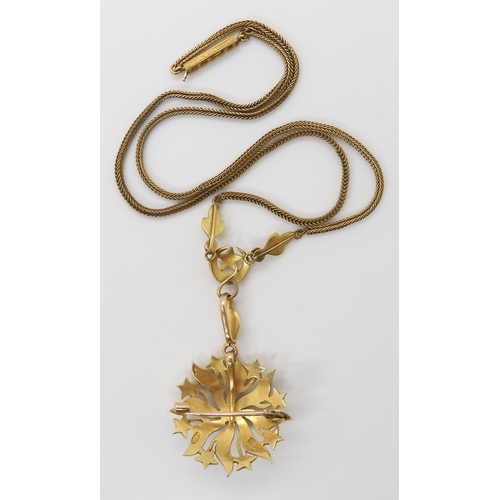 663 - A 15CT GOLD PEARL SET EDWARDIAN PENDANT BROOCHwith stars and moon design, the removable brooch can a... 