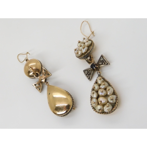 667 - A PAIR OF PEARL DROP EARRINGSset in yellow and white metal throughout, with diamond and sapphire bow... 