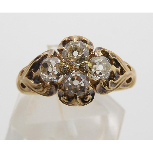 670 - AN ART NOUVEAU DIAMOND RINGthe yellow metal mount with chased foliate design is set with estimated a... 