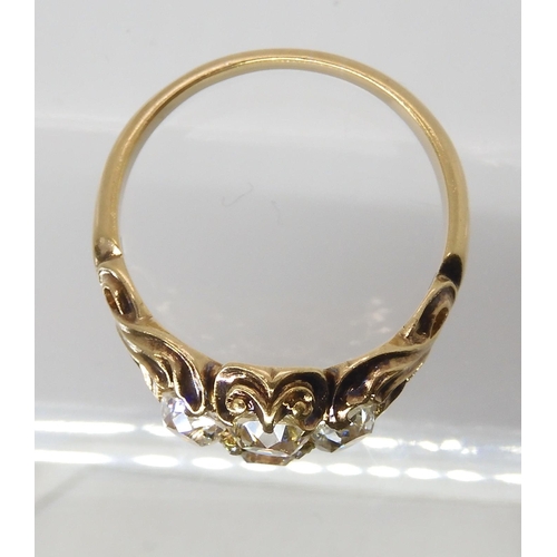 670 - AN ART NOUVEAU DIAMOND RINGthe yellow metal mount with chased foliate design is set with estimated a... 