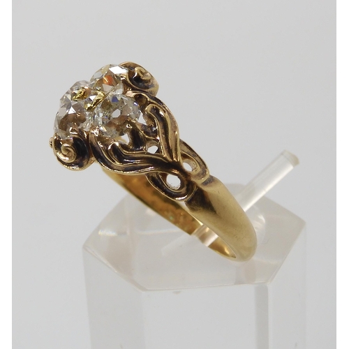 670 - AN ART NOUVEAU DIAMOND RINGthe yellow metal mount with chased foliate design is set with estimated a... 