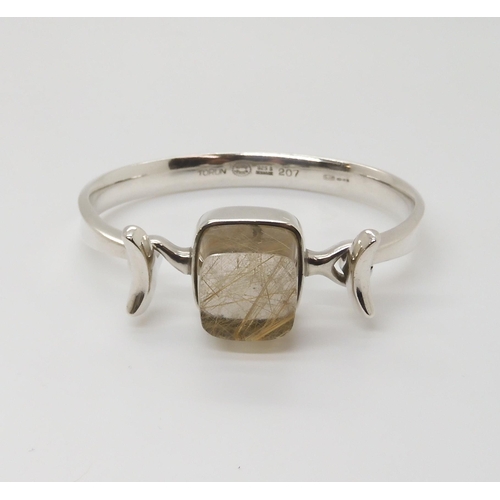 673 - A SILVER GEORG JENSEN BANGLEdesigned in the 1960's, by Vivianna Torun Bulow Hube for Georg Jensen, b... 